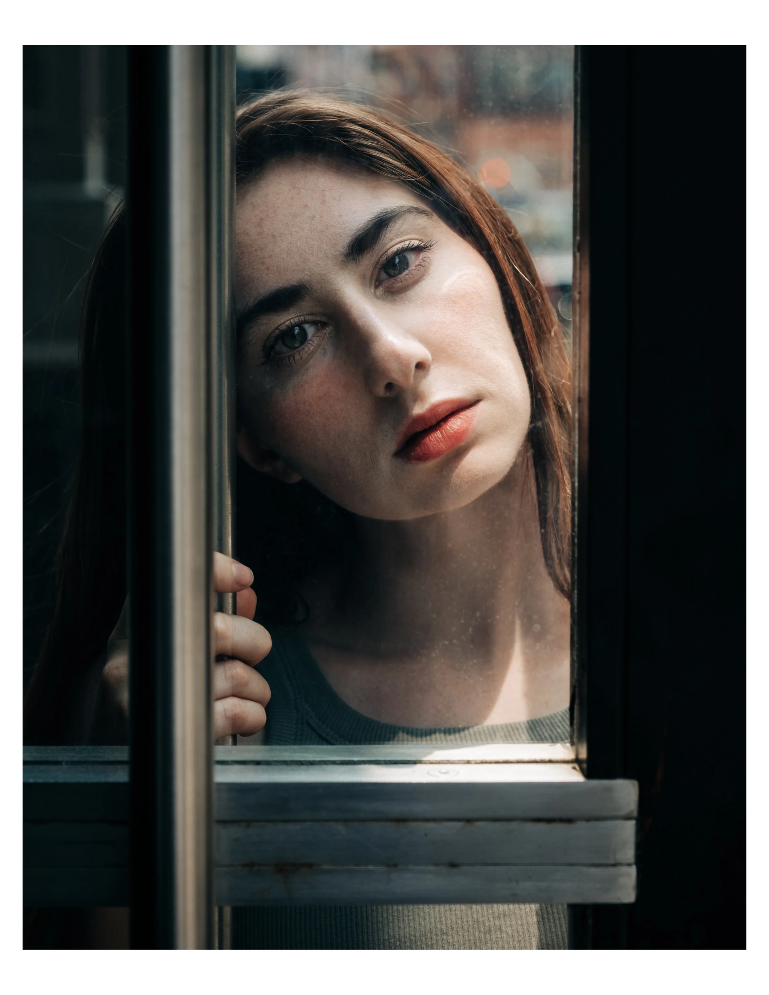 emma behind glass.jpg