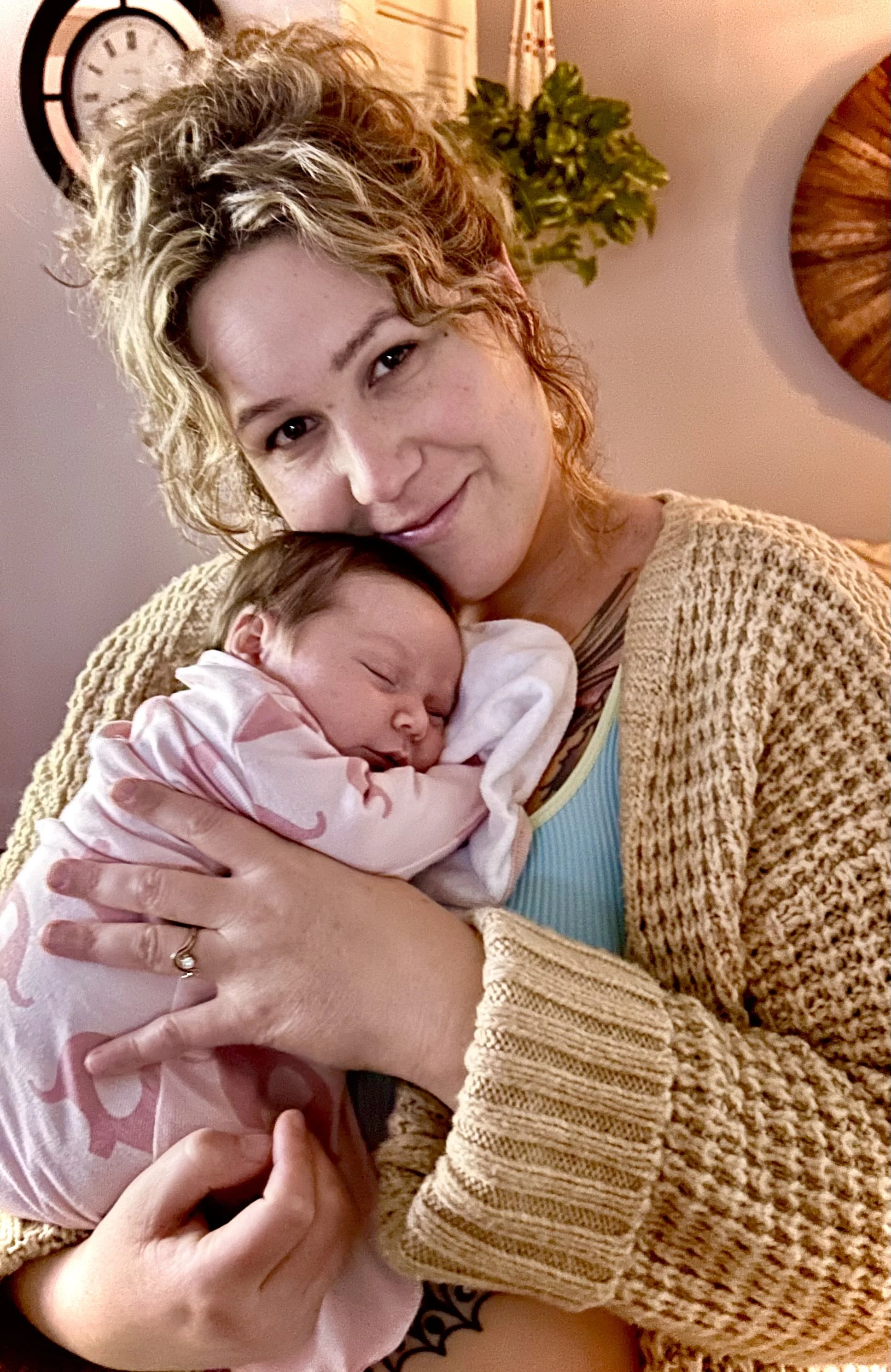 Haley Foulkes embracing motherhood, postpartum healing, and newborn connection.