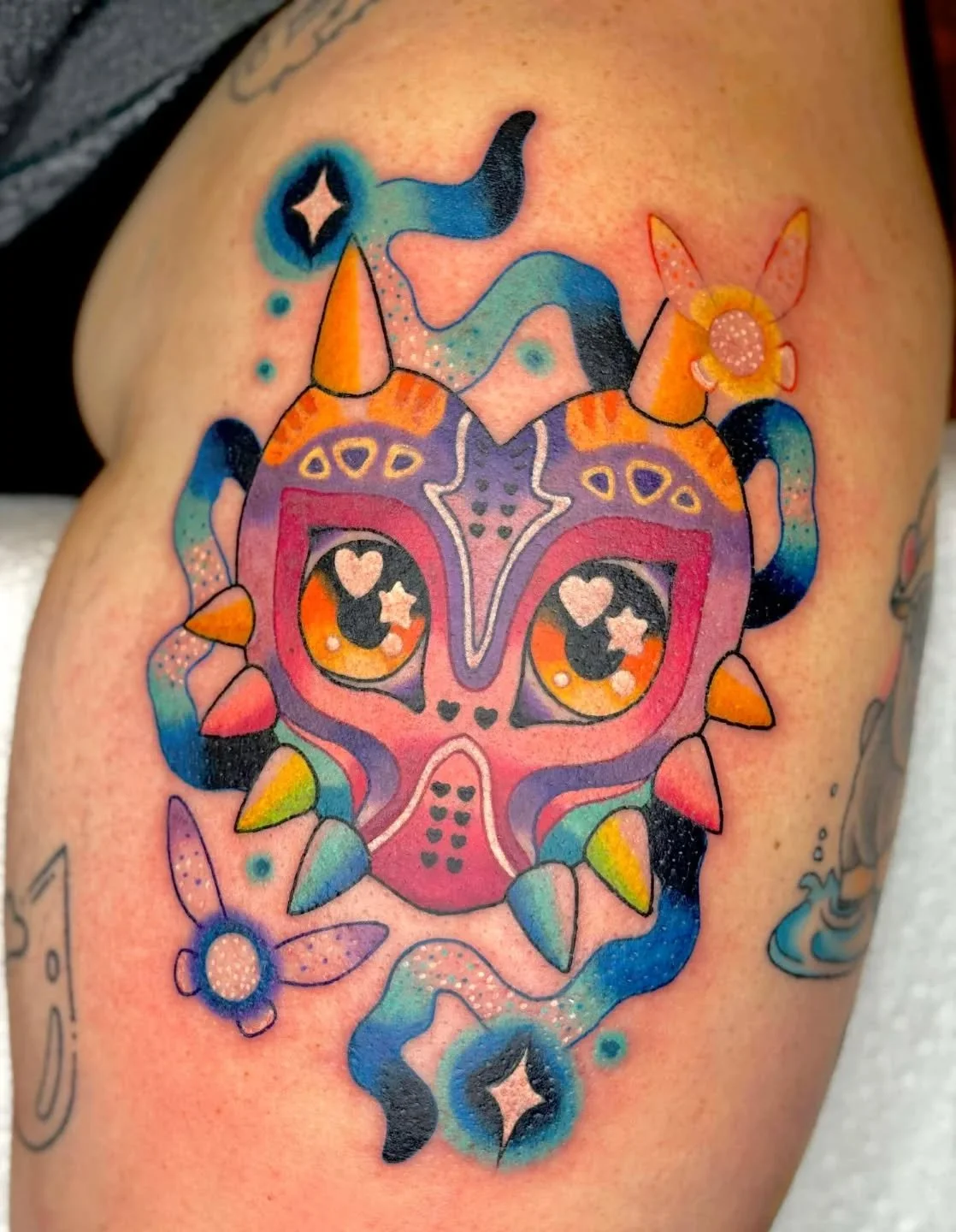 Majora mask done by @zhetacreations  We cant get over how cute it is! If bright colors are your thing, then Liv is the artist for you! They are currently booking for March. Send an inquiry today to book! ✨Link in bio ✨

#colortattoos #zelda #thistlea