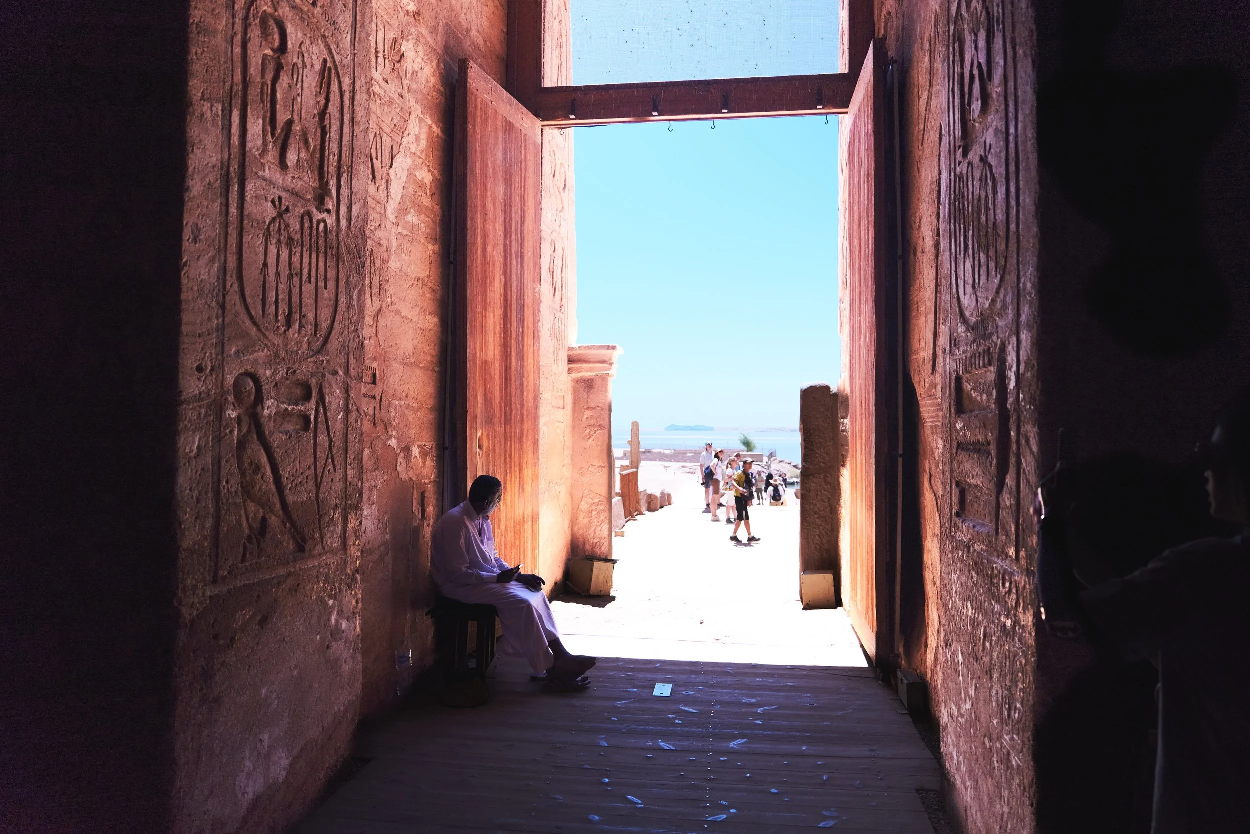 A doorman stands at the entrance of Abu Simbel
