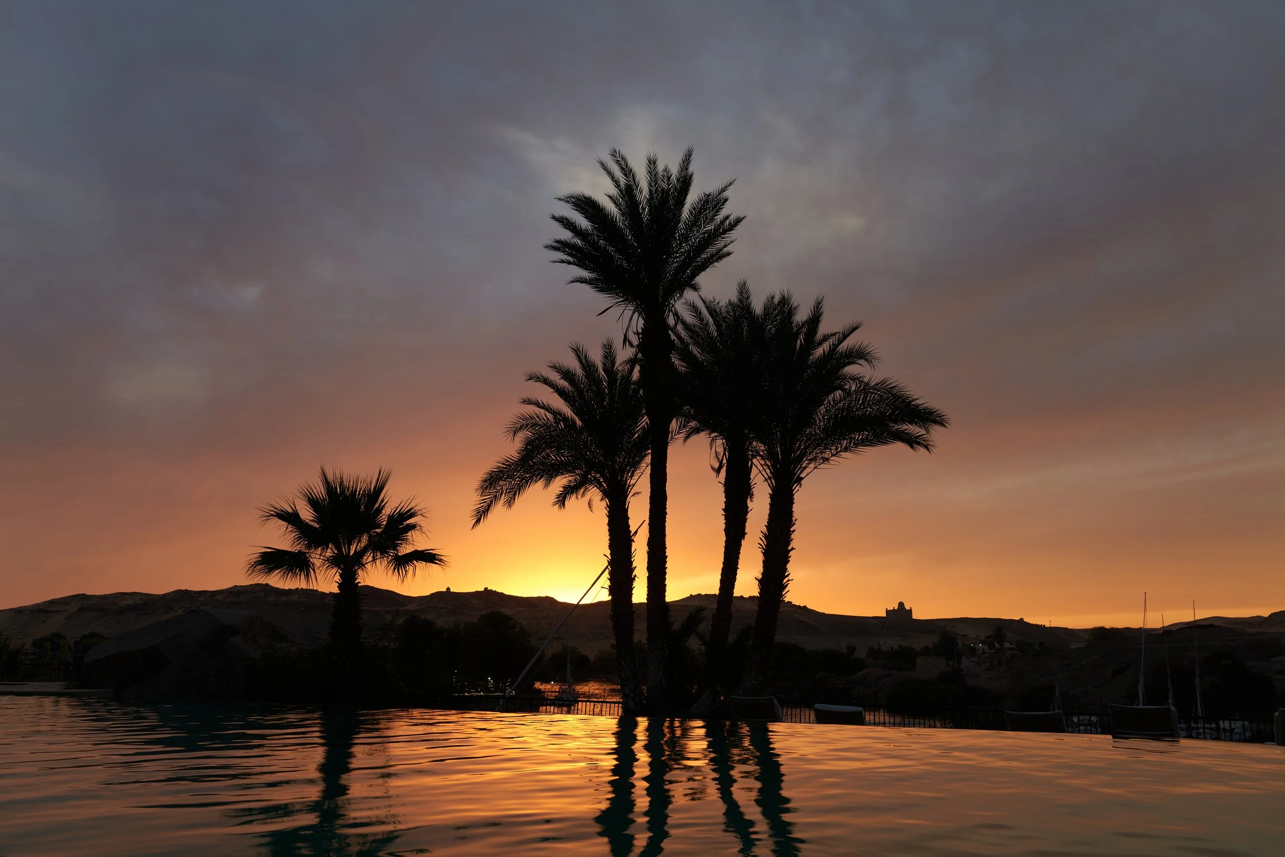 Sunset over Aswan, where the Nile glows in warm golden light