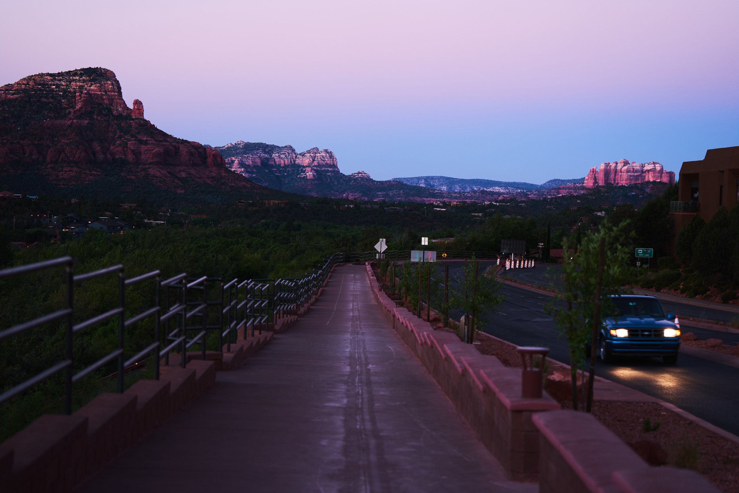 Quiet dawn view from Uptown Sedona, with the serene beauty of red rocks glowing in the early light.
