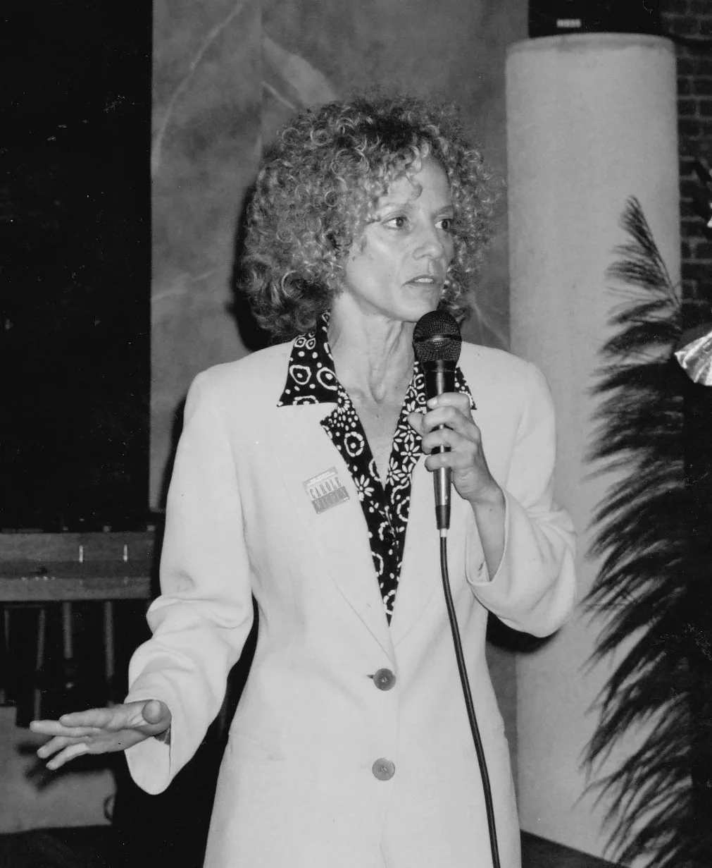 Carole speaking at an event
