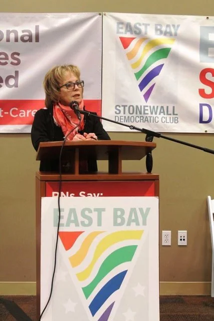 Carole speaking at the East Bay Stonewall Democratic Club