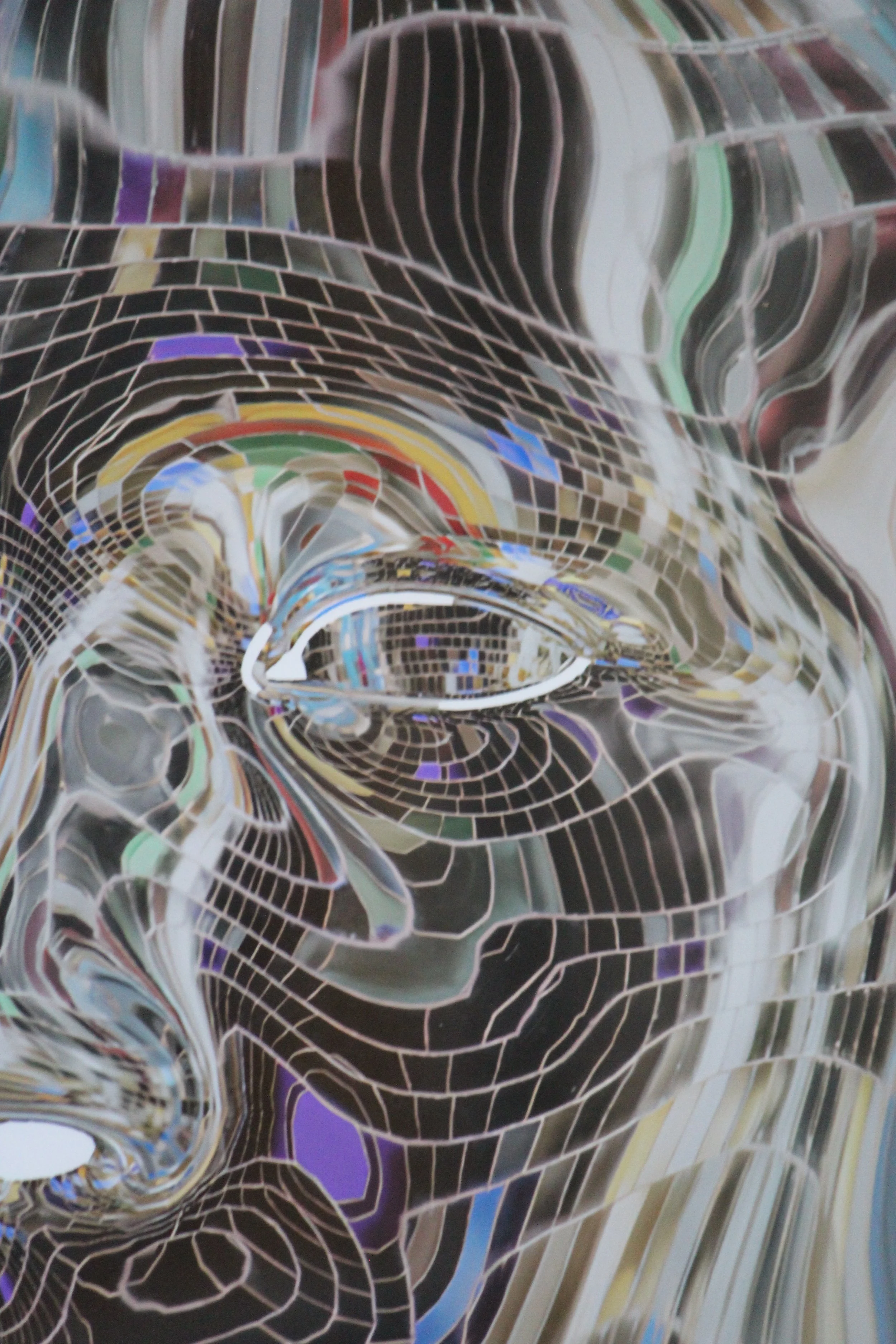 Close up image showing details of the silver and colourful disco head.