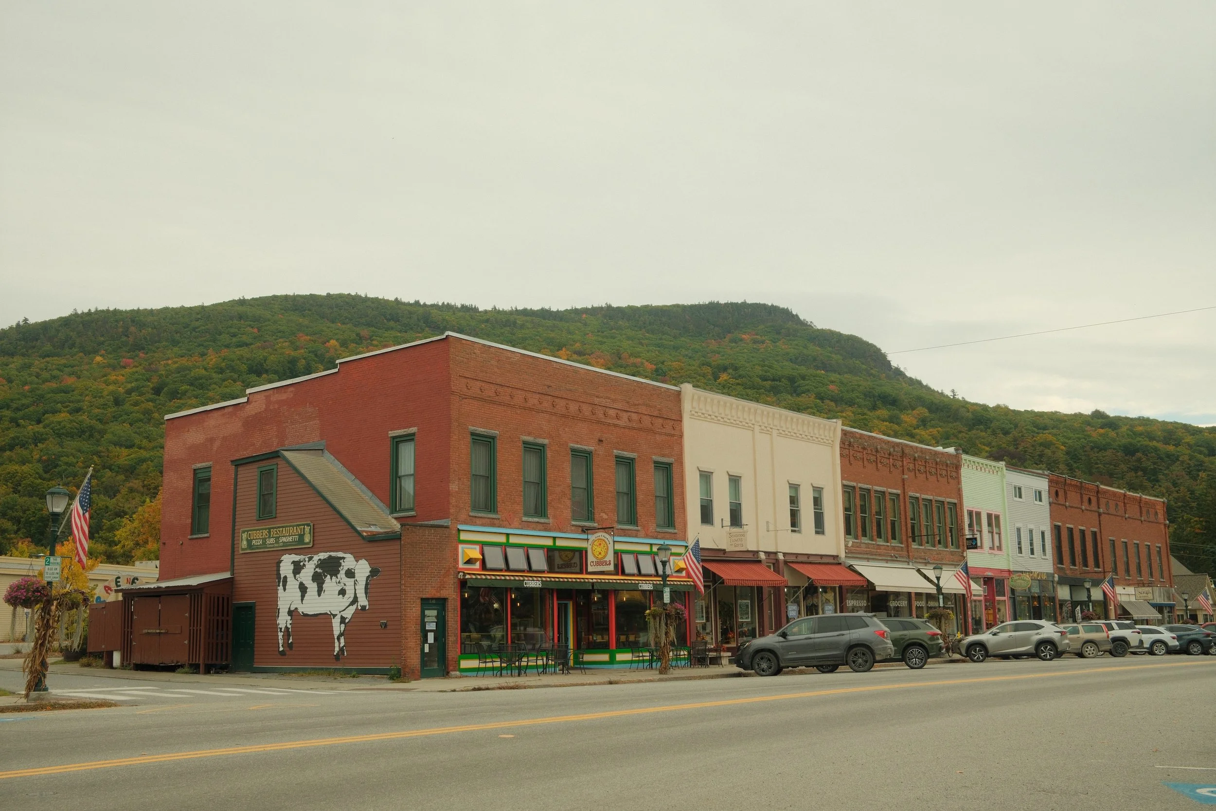 Downtown Bristol in Autumn with mountains behind a row of charming shops