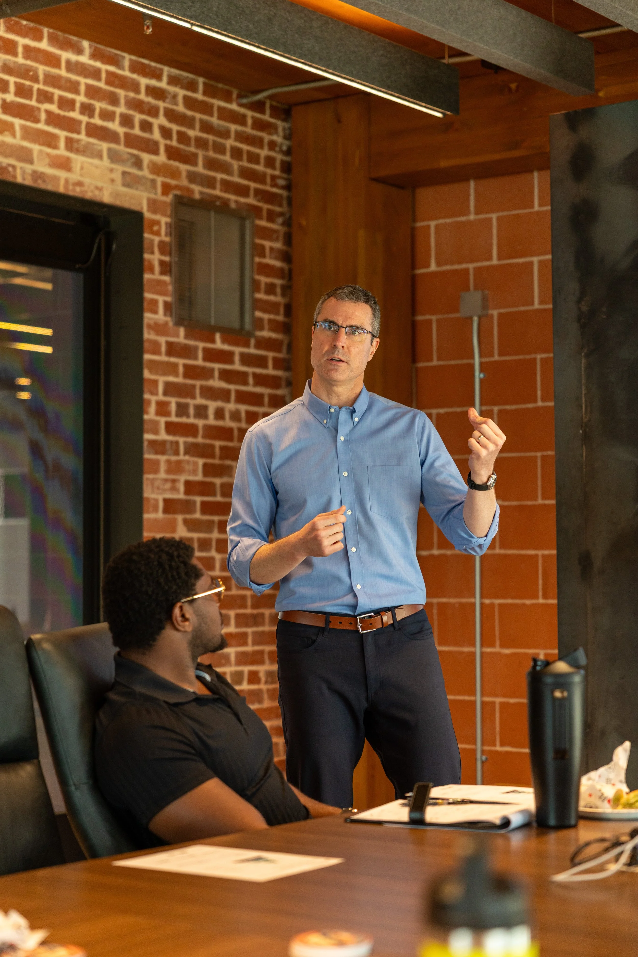 Adam Carroll leading an AI operations working session for a privately-held firm in San Antonio.