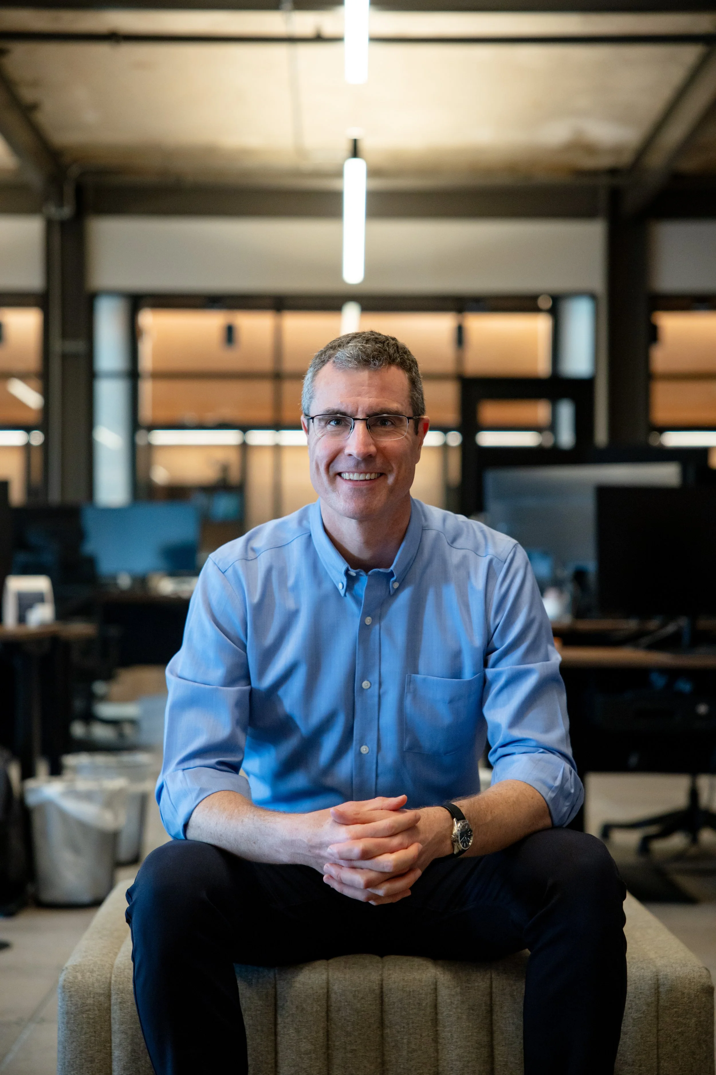 Adam Carroll, fractional COO and AI consultant serving Texas and Latin America.