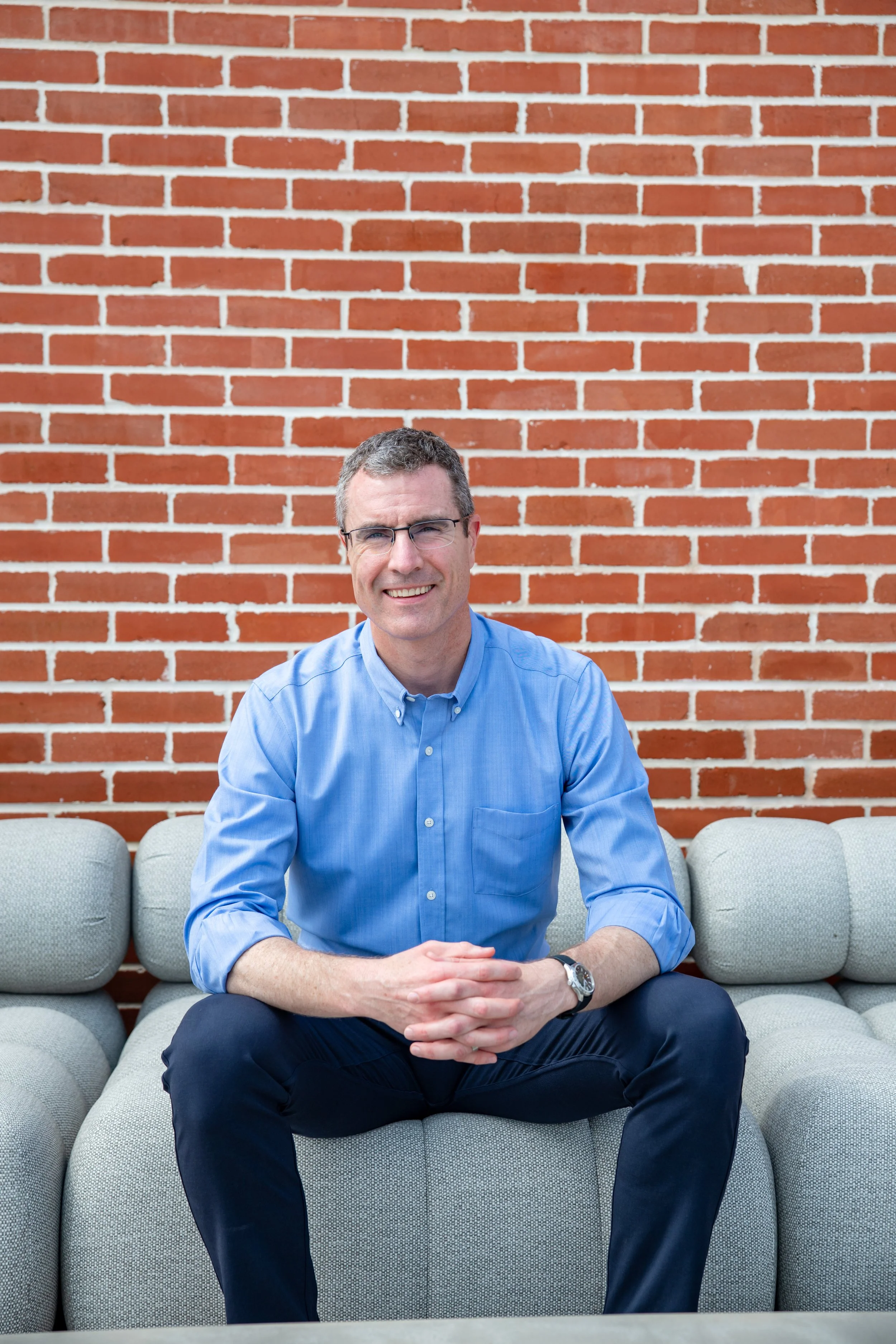 Adam Carroll, founder of Carroll Strategy & Operations, an operations and AI advisor in San Antonio, Texas.