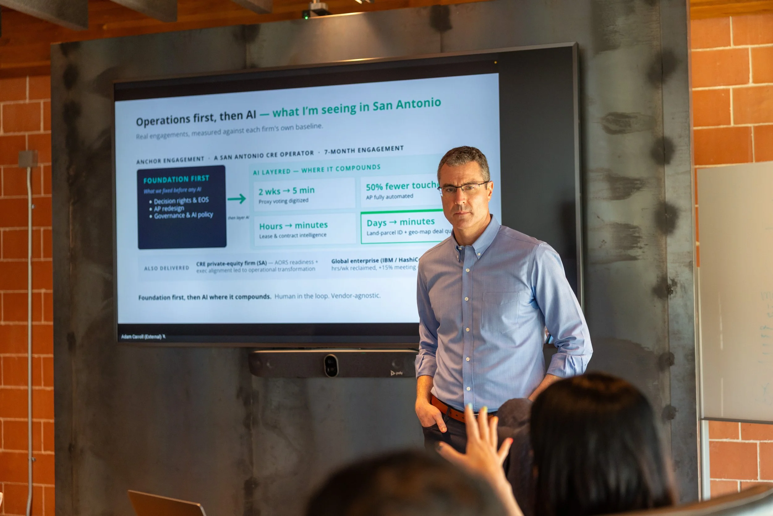 Adam Carroll leading an AI operations working session for a privately-held firm in San Antonio.