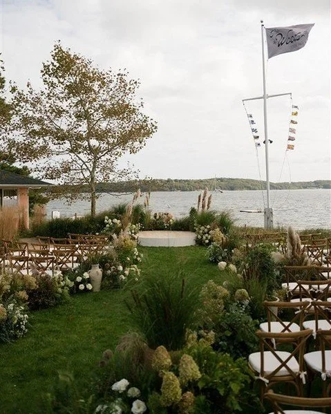 For our client’s ceremony design, the goal was to create something that felt effortlessly integrated into the natural beauty of @silversandsmotel. A woven aisle set the tone—simple, textural, and refined—as the breathtaking backdrop