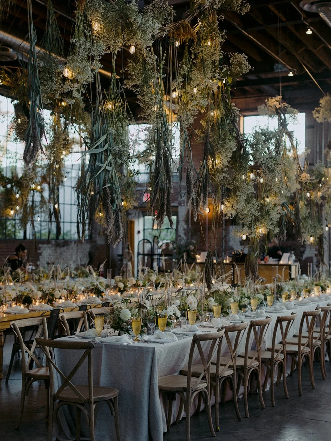 Still one of my favorite designs to date- the moment we all felt seeing that room come together was nothing short of magic. The hanging branches were perfection! 

Planning: @rachelbeharevents
Venue + Bar: @99scott_weddings @99scott_
Band: @Elementmu