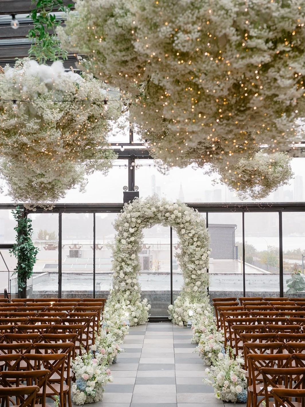 Still not over this 74Wythe ceremony. There was a clear vision&mdash;an airy floral aisle, a full arch moment, and just the right glow overhead.

Planner: @rachelbeharevents
Photographer: @chichiarilove
Venue, Drinks + Staff: @74_wythe 
Officiant: @h