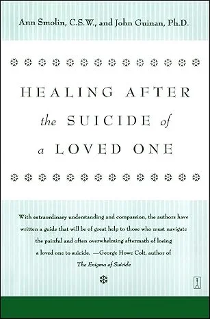 Book cover titled 'Healing After the Suicide of a Loved One' by Ann Smolin and John Guinan, featuring a white background with decorative black floral borders and green section at the bottom.