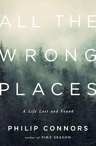 Book cover titled 'All the Wrong Places: A Life Lost and Found' by Philip Connors, featuring a foggy forest scene with evergreen trees.