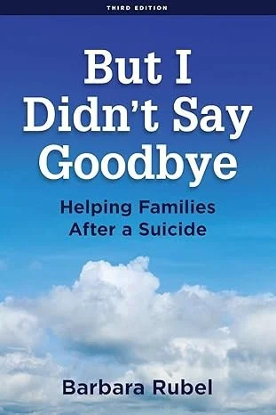 Book cover titled 'But I Didn't Say Goodbye: Helping Families After a Suicide' by Barbara Rubel, featuring a blue sky with clouds.
