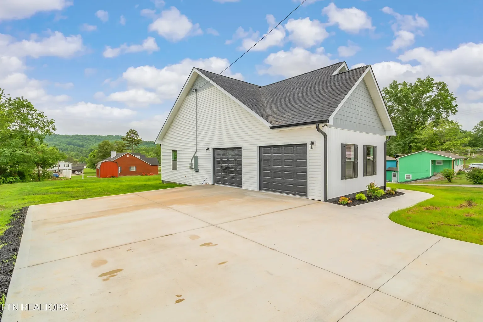 Painted and installed gray siding.