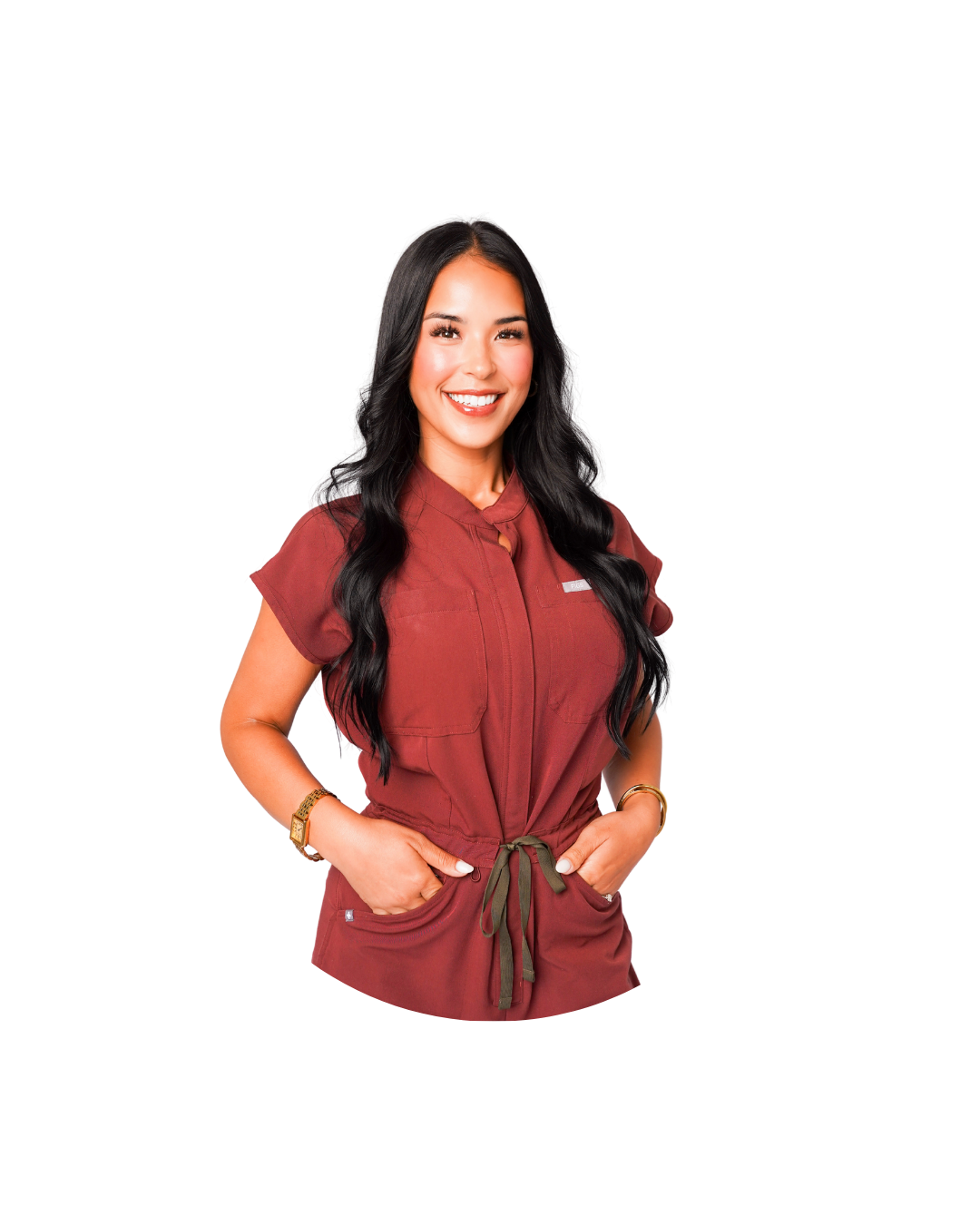 A young woman with long black hair smiling and putting on black disposable gloves.