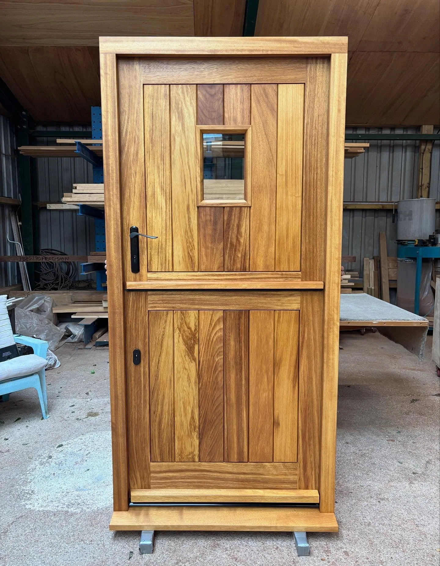Iroko stable door all finished and heading out of the workshop. Complete with multipoint locking system, @osmo_uk oil and @coastal_group_hardware including Duratique handle #iroko #stabledoor #door #oil #osmooil #woodwork #cornwall #joinery #bespoke 