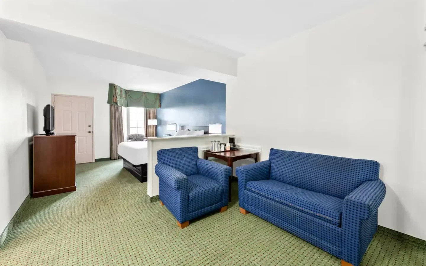 Spacious King Rooms with separate seating area and private Balcony