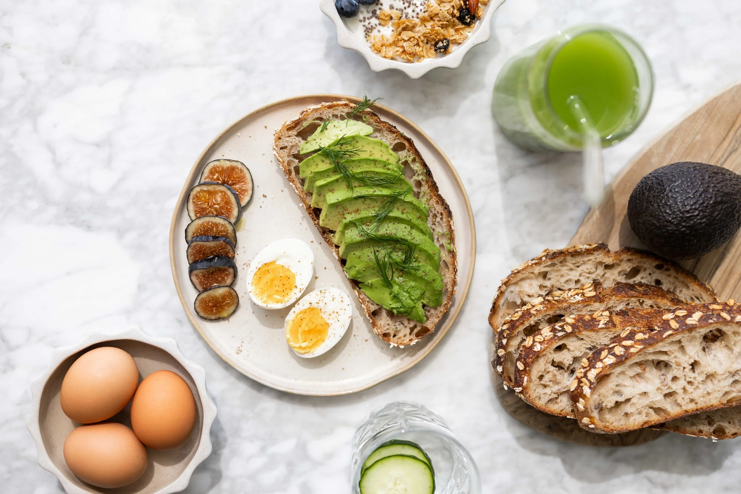 breakfast plate with nutrient rich food on marble countertop