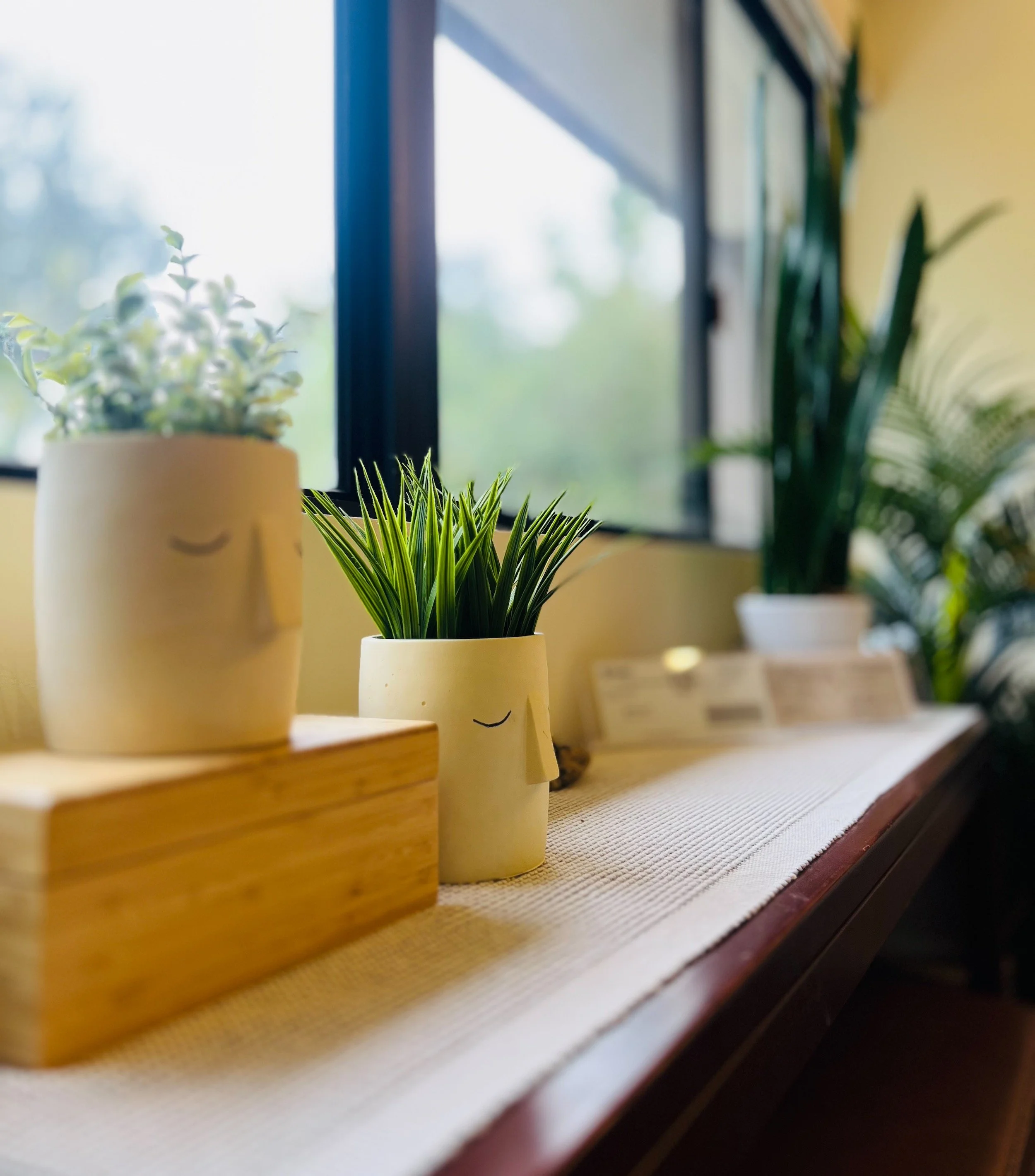 View of sculptures and plants in Ben Esch, LMFT's San Marino, CA therapy office.