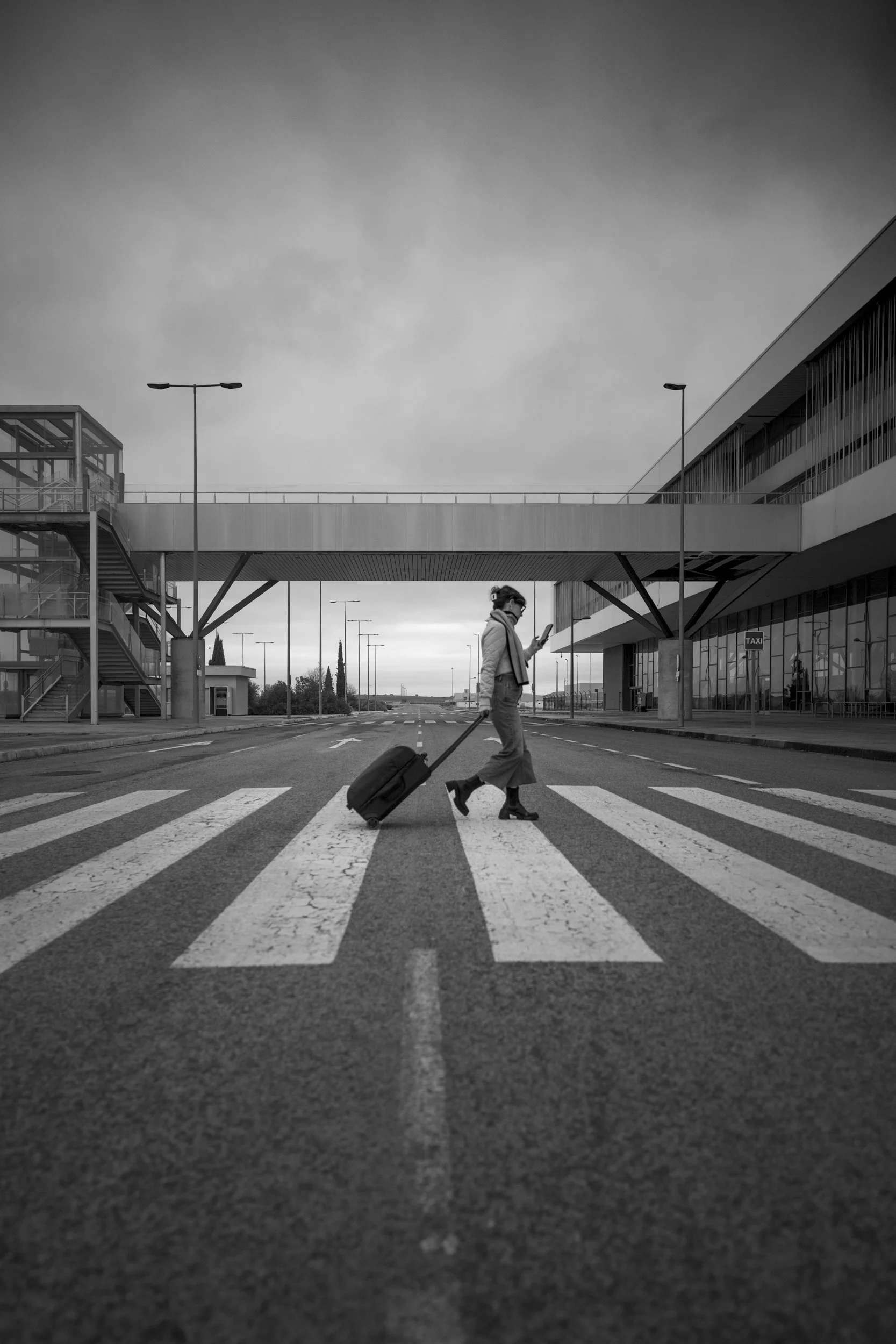 A distracted traveler walking to the abandonded Ciudad Real Airport in Spain