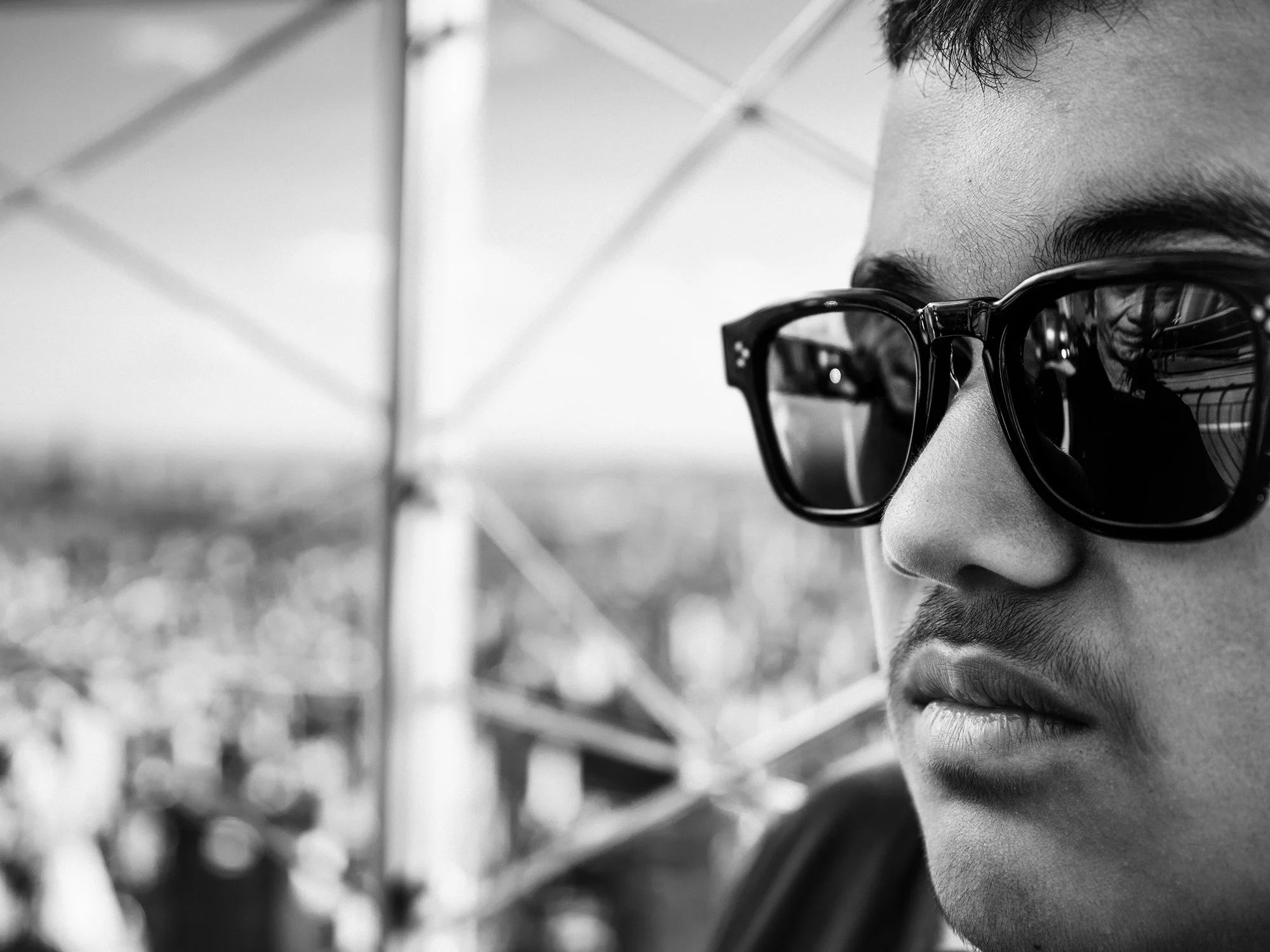 Black and white street portrait, atop Empire State building, NYC
