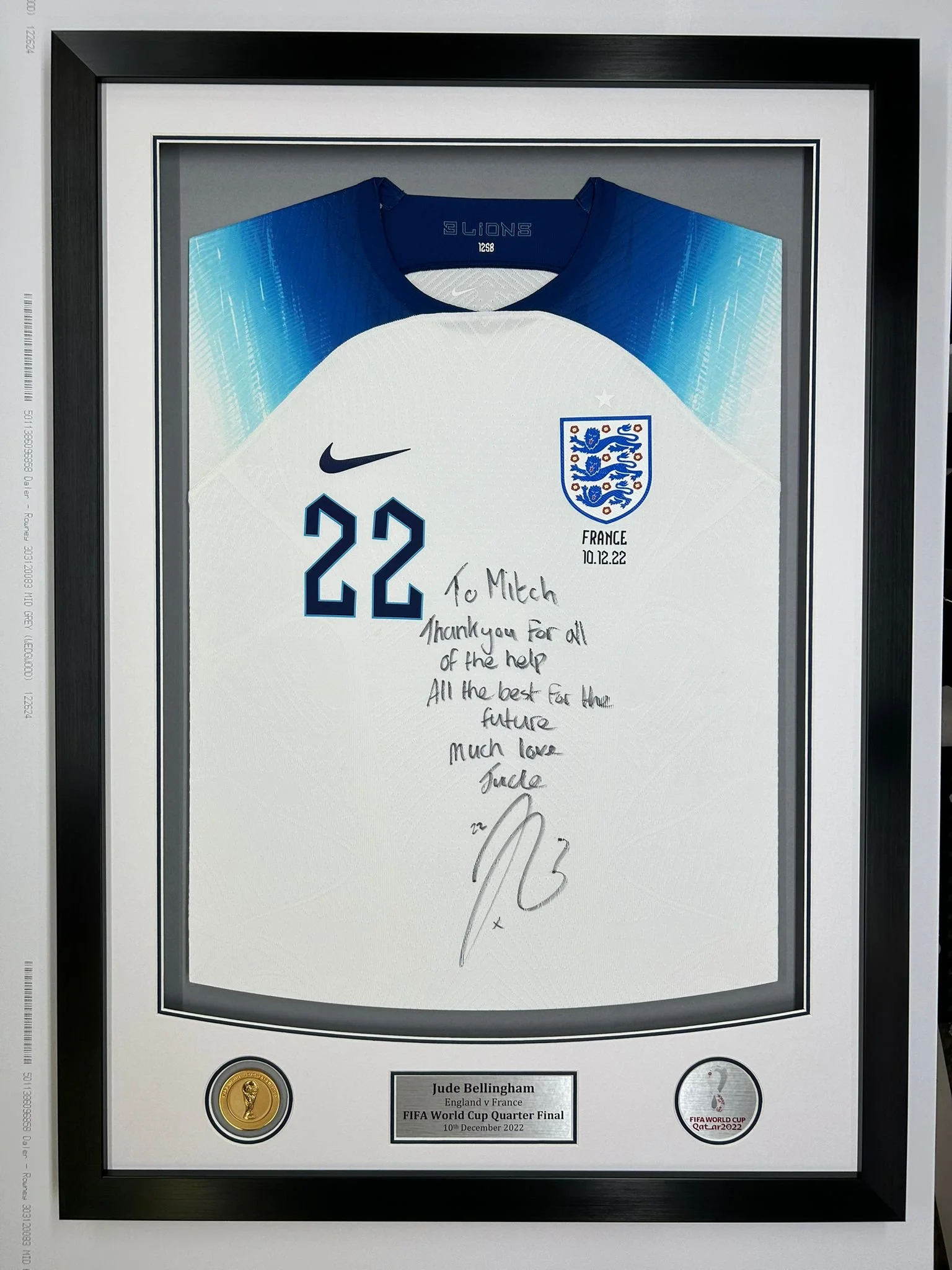 Framed framed England soccer jersey signed by Jude Bellingham, with personal message and signatures, displayed with FIFA World Cup quarter-final details.