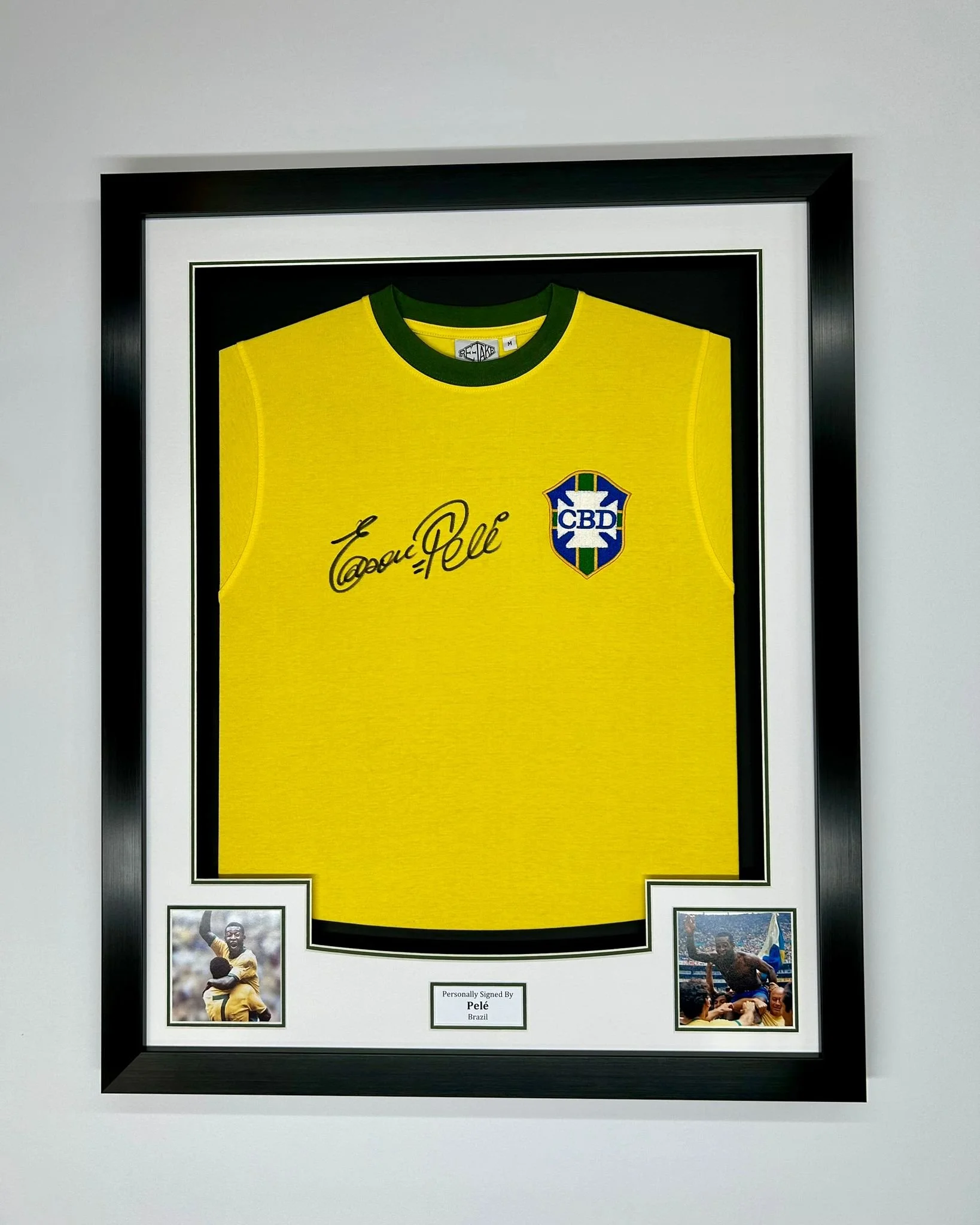 Yellow Brazilian national football jersey signed by Pelé, with Brazil's football logo and the autograph visible, framed with two photos of Pelé signing and celebrating.