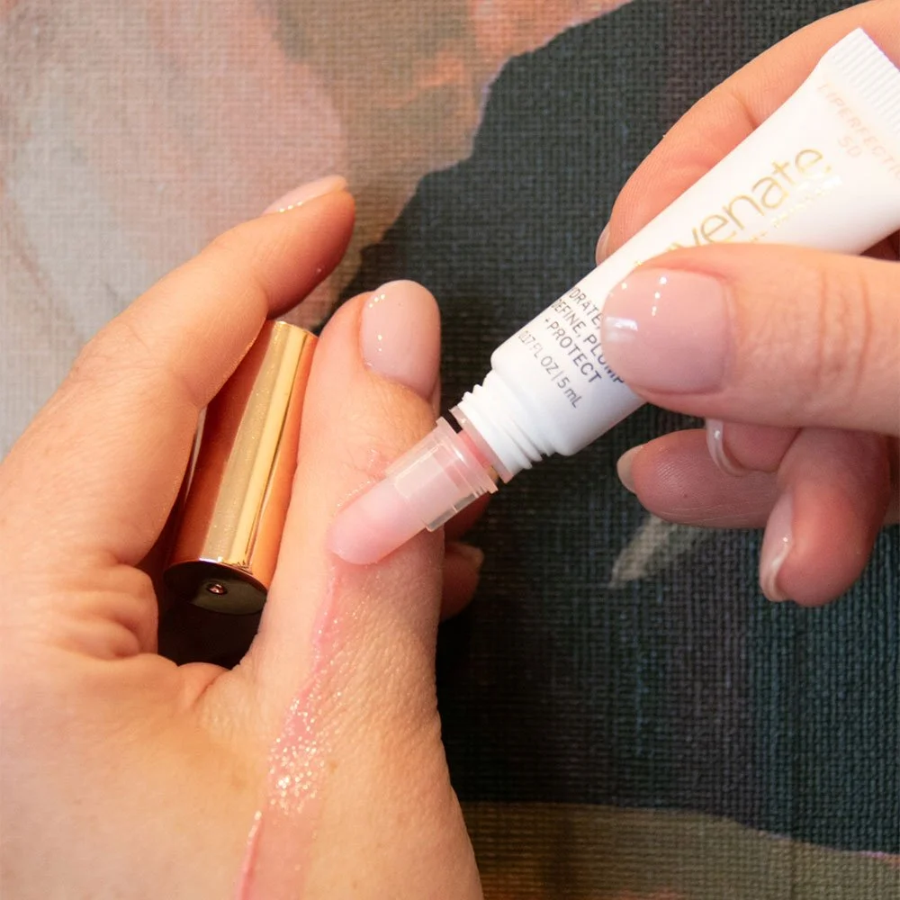 close up applying Juvenate LiPerfection 5D to hand