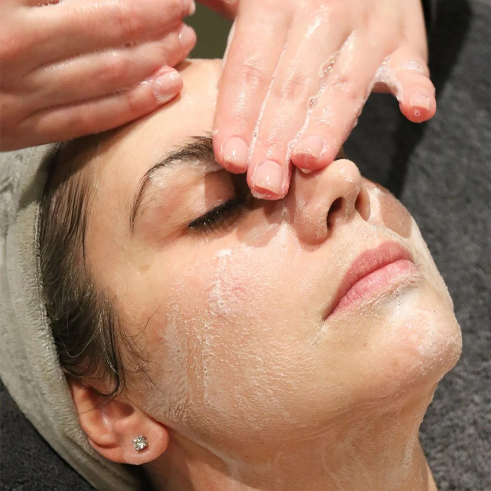 washing face with Juvenate PhytoCleanse