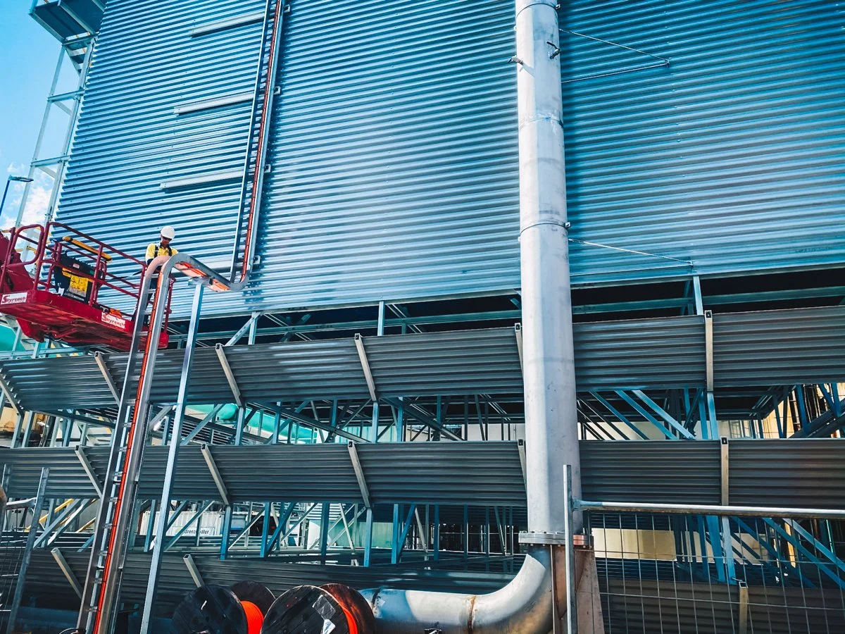 massive pipe up side of a building