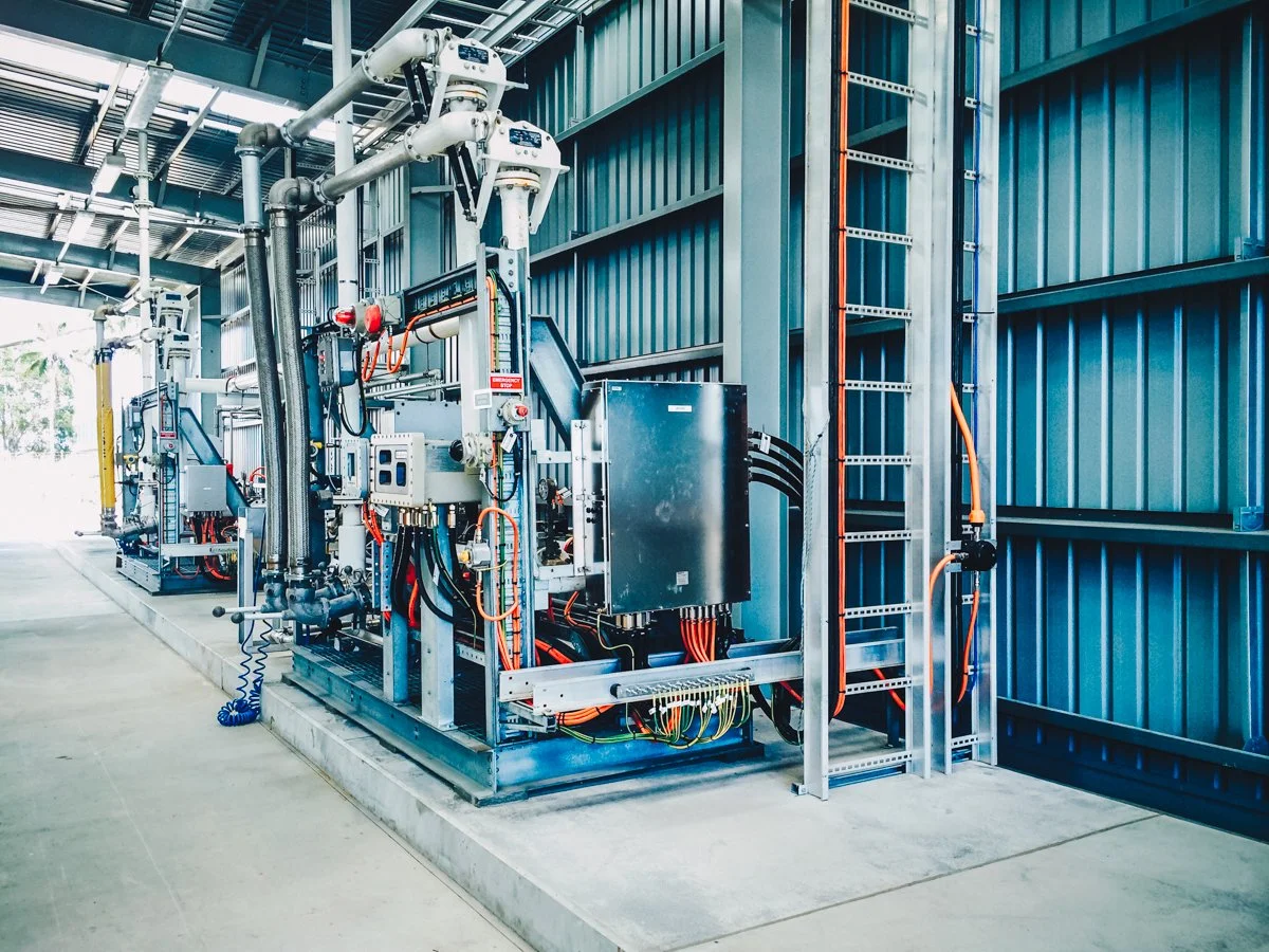 massive electrical system with pipping and an electrical circuit board attached