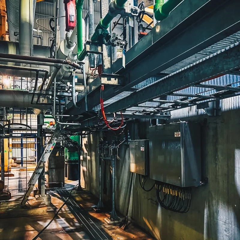 Massive electrical system along the wall with electrical control panels 