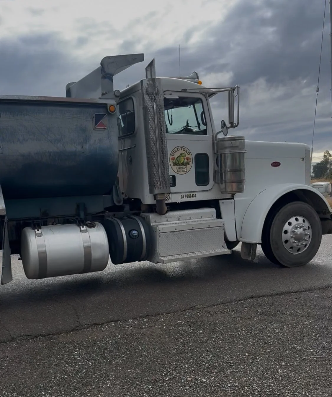 Bulk material delivery truck from Wild Toad Landscape Materials providing service to Anderson, Redding, Cottonwood, and surrounding communities.