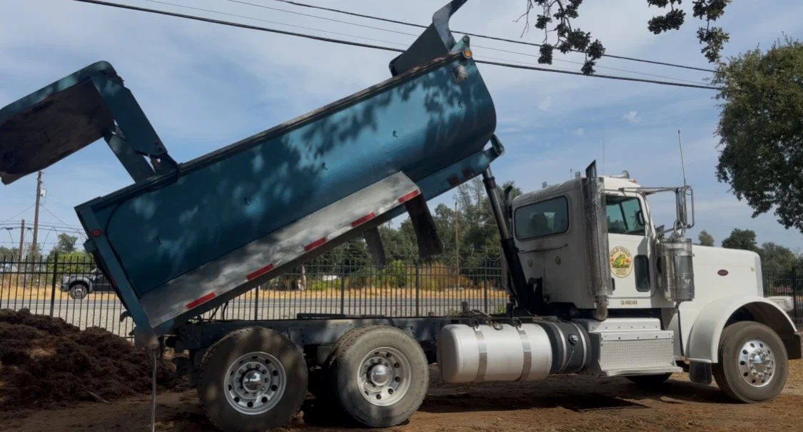 Bulk material delivery truck from Wild Toad Landscape Materials providing service to Anderson, Redding, Cottonwood, and surrounding communities.