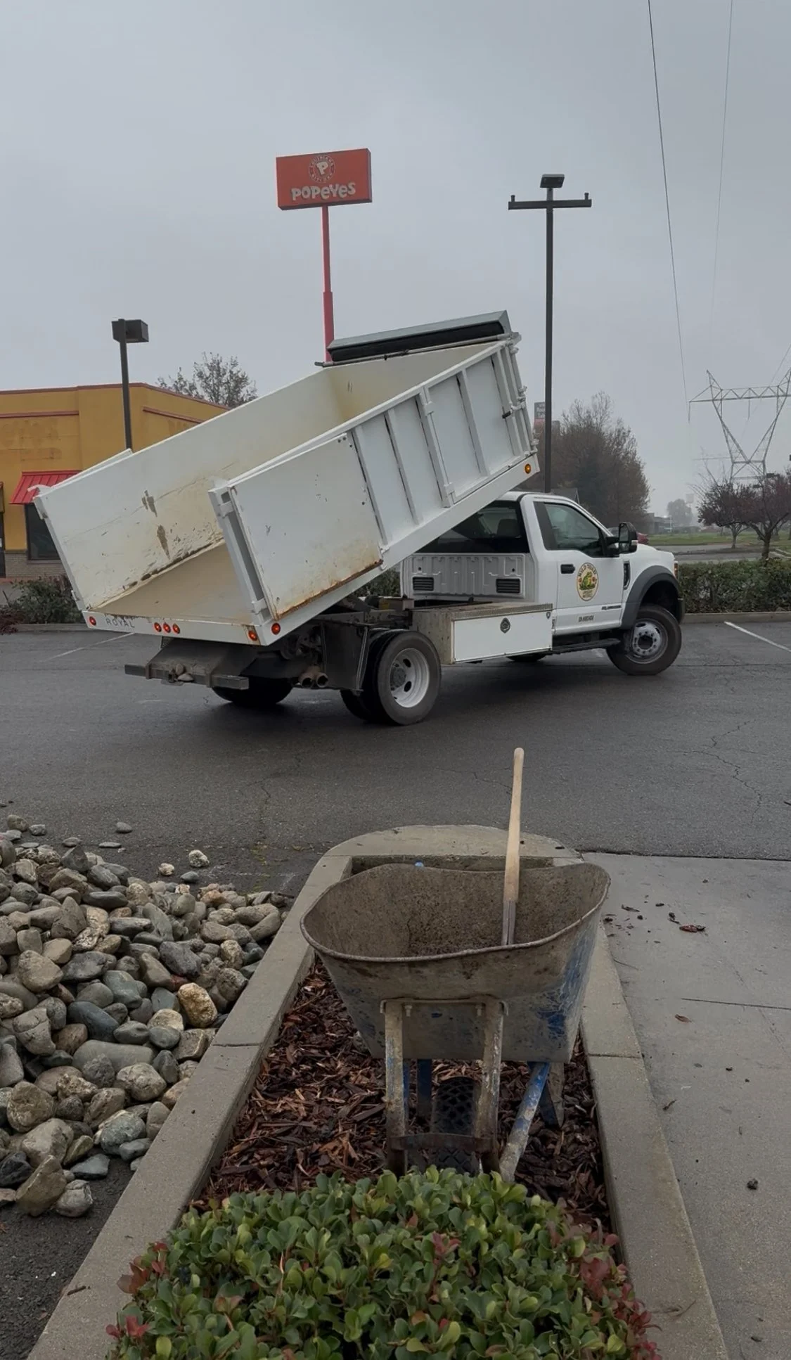 White utility dump truck used for material hauling by Wild Toad Landscape Materials serving Anderson, Redding, Cottonwood, and nearby Northern California communities.