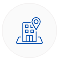 Icon of a building with a location pin on top.