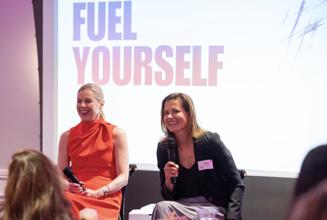 Conference speaker panel, women with microphone