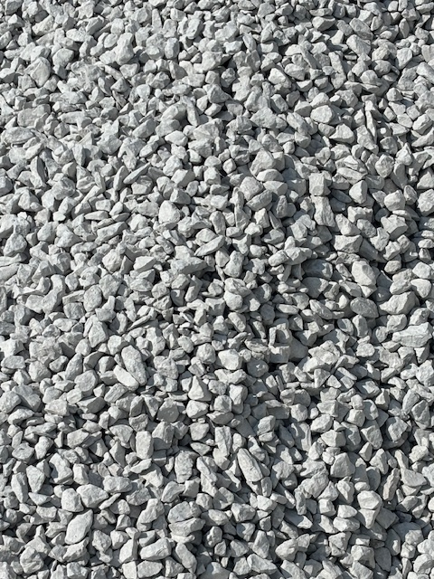 Gray gravel stones scattered on the ground.