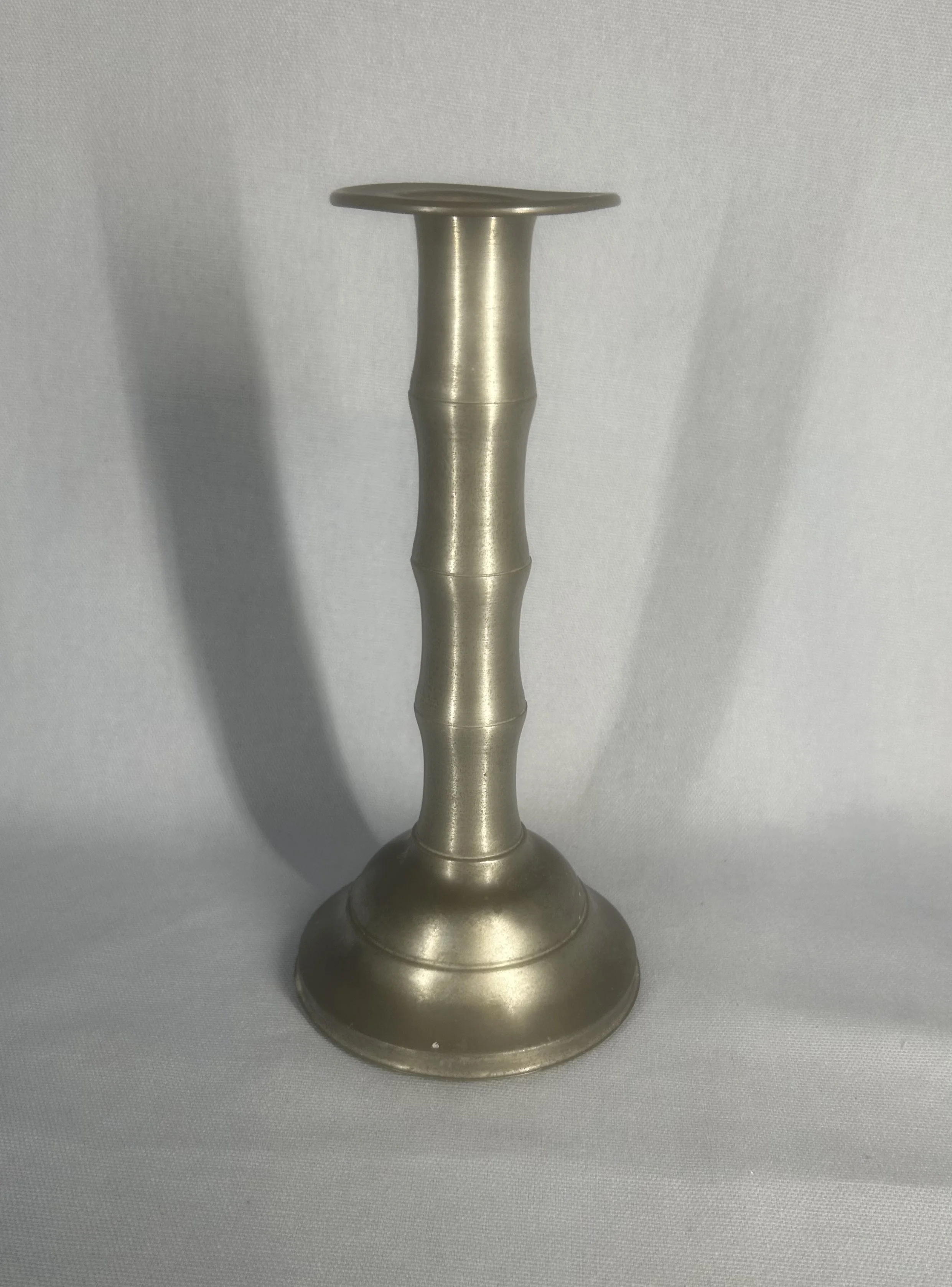 English Pewter Candlestick, Late 19th – Early 20th Century (c. 1880–1915).  The design reflects late Victorian to Edwardian taste.
