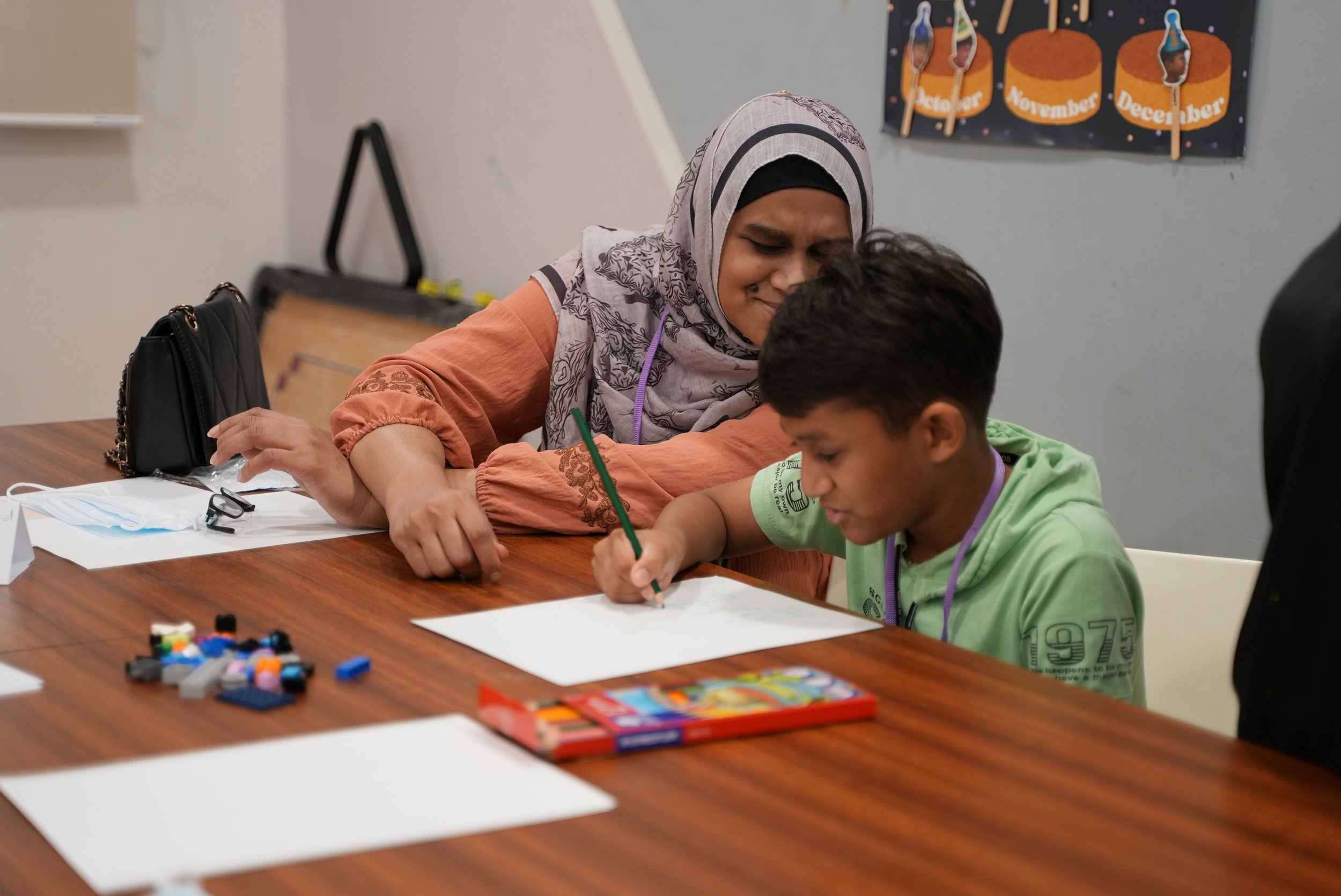 A mother and son pair doing an activity together