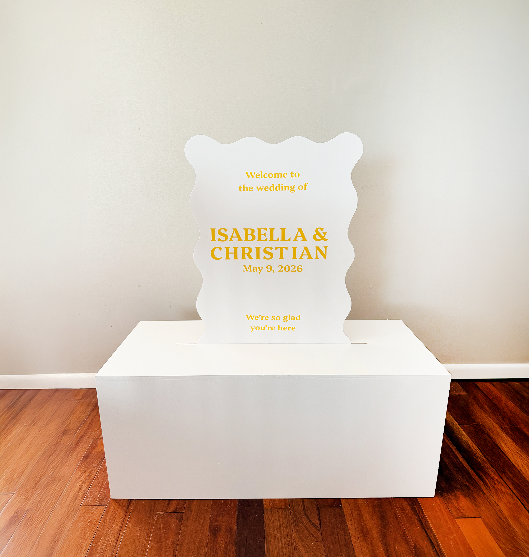 White wavy edge sign in a white rectangular base