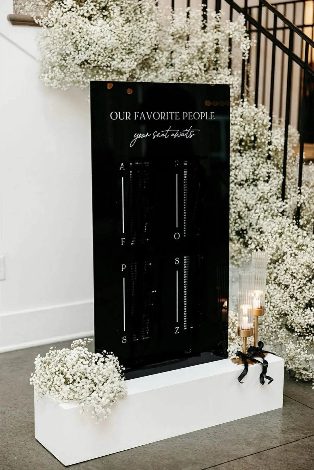 Large acrylic sign on white stand base