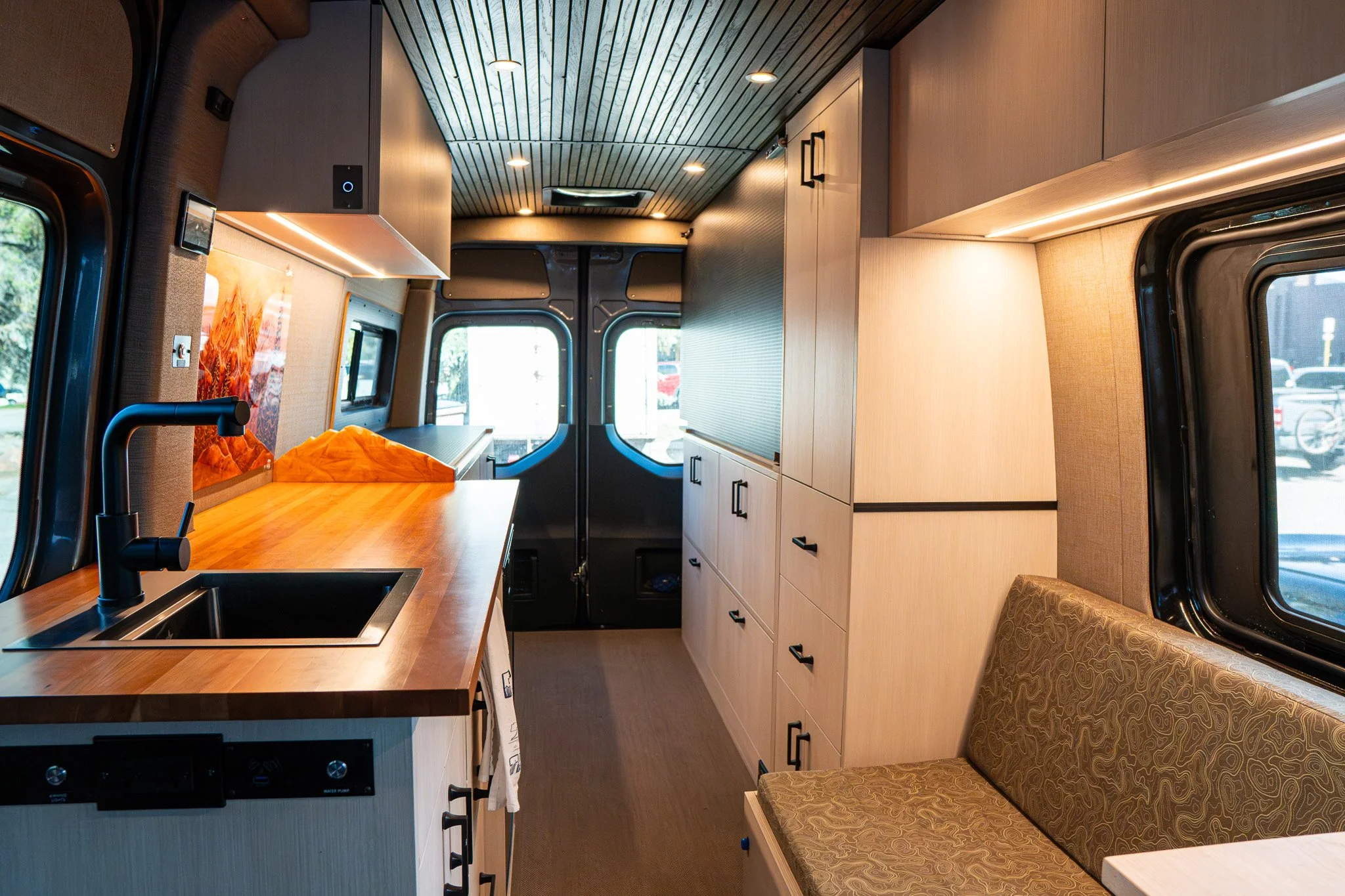 A professional sprinter van build with custom components that make it look like a luxury house. Built by White River Overland in Aspen, CO.