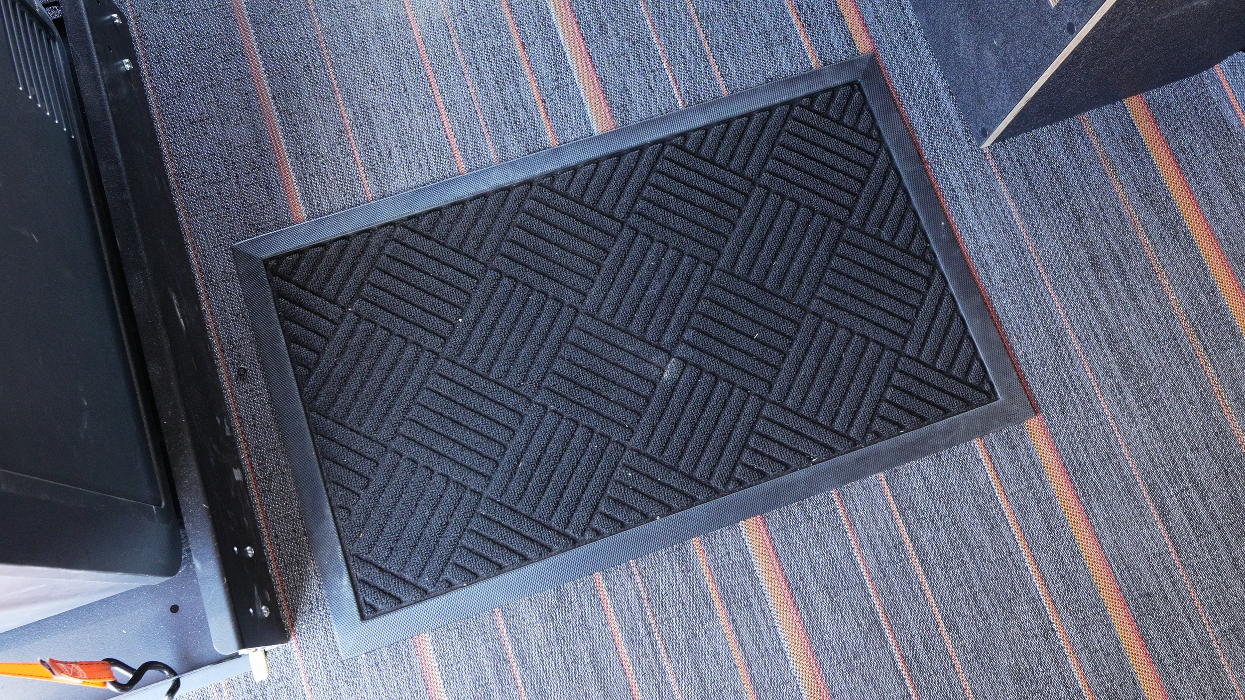 Heavy duty floor mat to keep the interior of a camper van clean