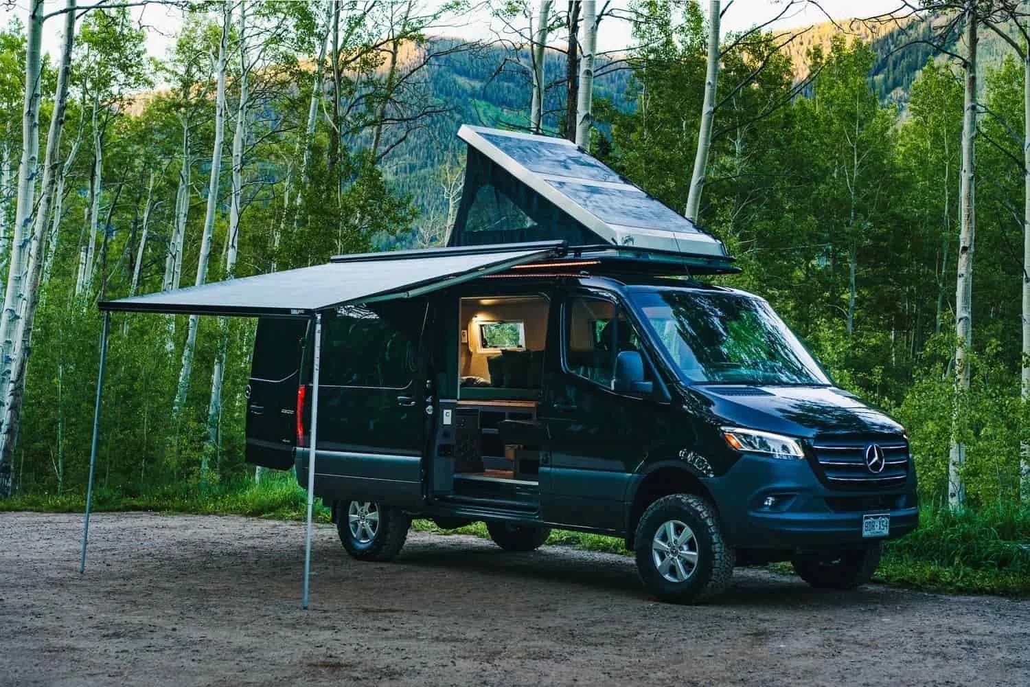 Black Camper Van from White River Overland