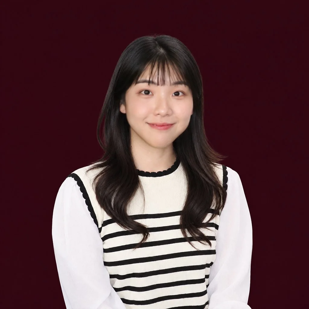 Close-up of Dr Joy Seok, a female chiropractor trained in the evidence-based Gonstead technique. She specialises in elderly chiropractic care and in neck and back conditions related to prolonged sitting.