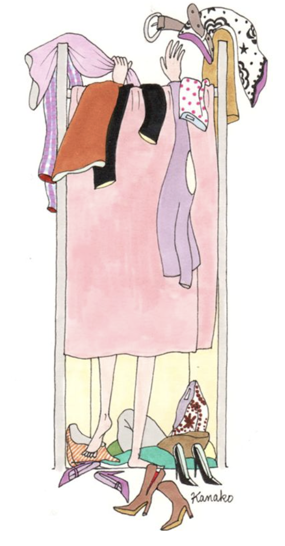 A woman standing in a wardrobe with clothes, shoes, and accessories around her, with only her legs visible under a hanging pink dress.